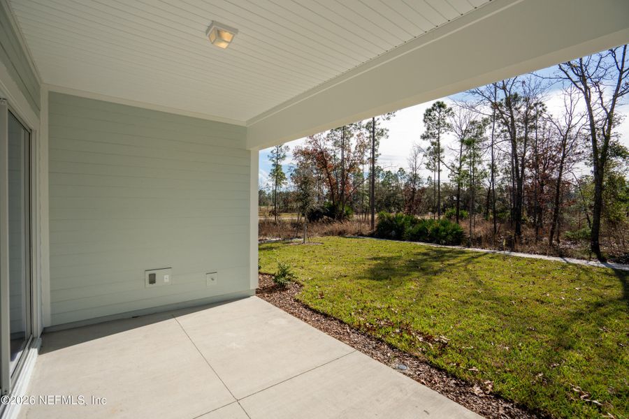 Exterior details and patio area of a home in SilverLeaf, St. Augustine (Image 3).