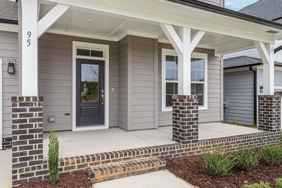 Exterior details and patio area of a home in Serenity - The Cottage Collection, Fuquay Varina (Image 3).
