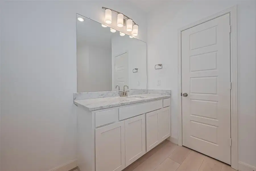 Furnished interior view inside a new home in Regents Court, Houston (Image 16).