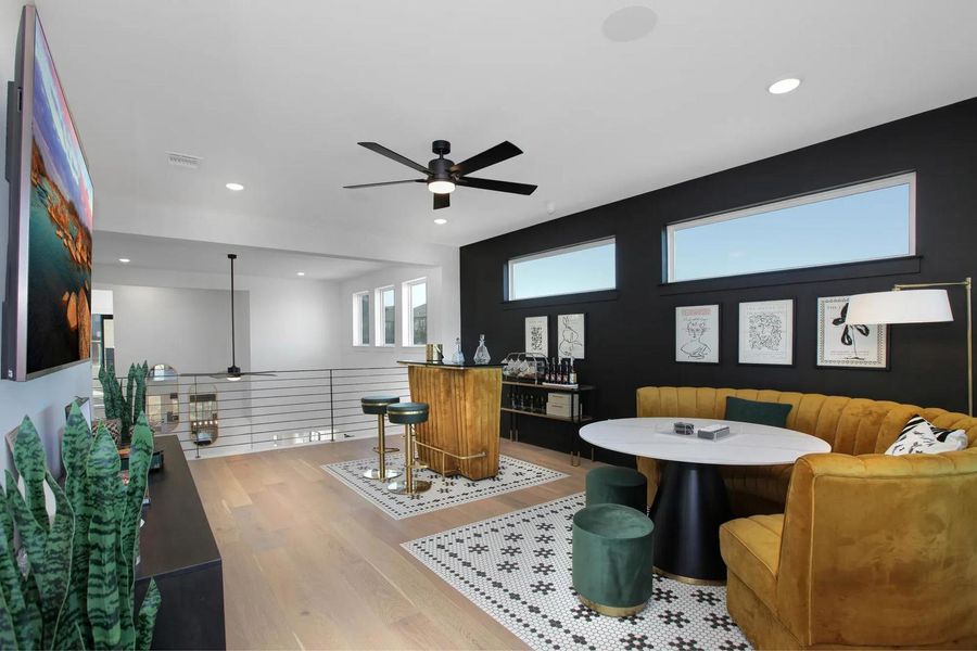 Furnished interior view inside a new home in Rough Hollow The District, Lakeway (Image 11).