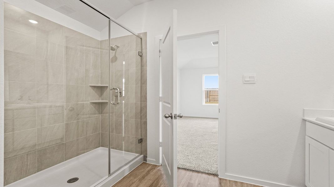 Furnished interior view inside a new home in Sunterra, Katy (Image 10).