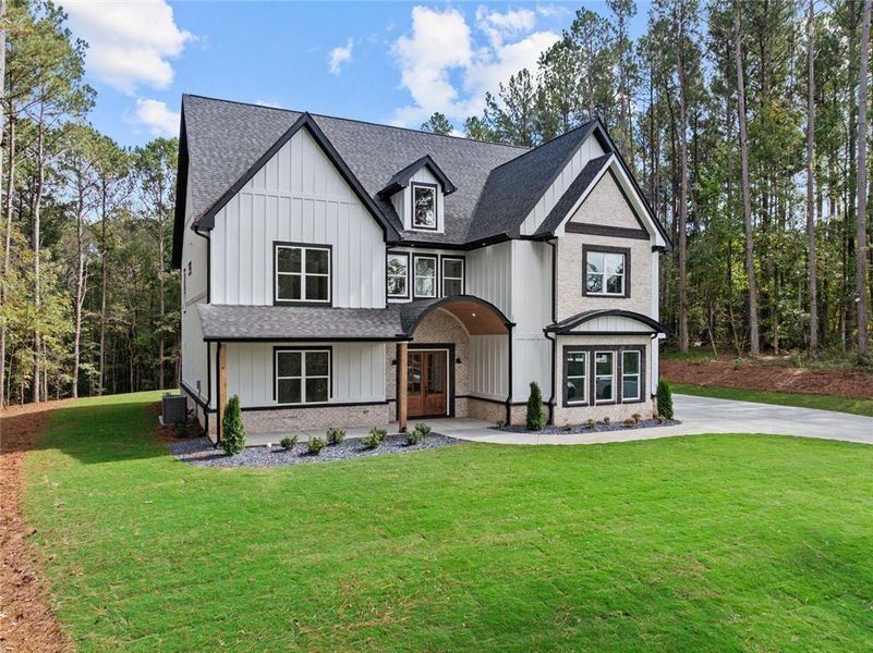 Front exterior of a new home in , Winder, GA, highlighting curb appeal (Image 32).