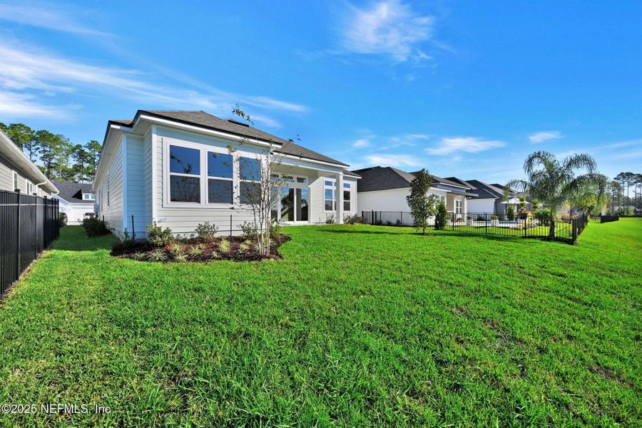 Exterior details and patio area of a home in Amelia National Country Club, Fernandina Beach (Image 21). Exterior details and patio area of a home in Amelia National Country Club, Fernandina Beach (Image 21).