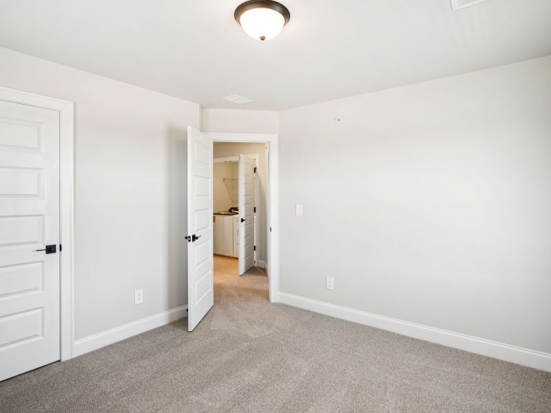 Spacious, unfurnished interior of a new home in Hemingway - Highland Series, Cumming (Image 19).