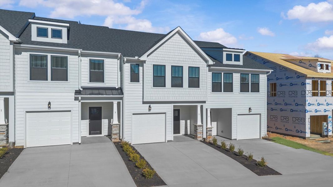 Notable curb appeal and elegant interiors of this Litchfield townhome in a reputable community near Simpsonville's core