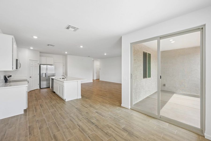 Dining into kitchen and great room Dining into kitchen and great room