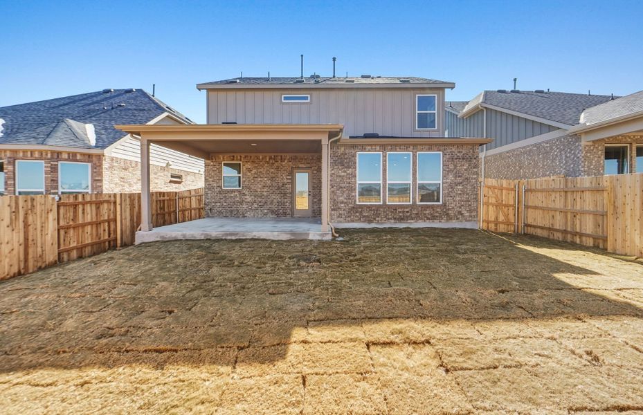 Exterior details and patio area of a home in Sunfield, Buda (Image 24).