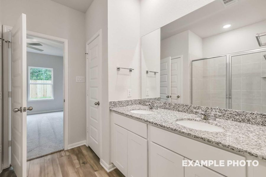 Furnished interior view inside a new home in Caney Creek Place, Conroe (Image 11).