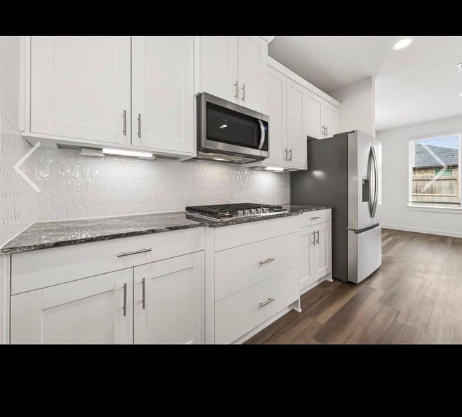 Furnished interior view inside a new home in Harvest Green, Richmond (Image 11).
