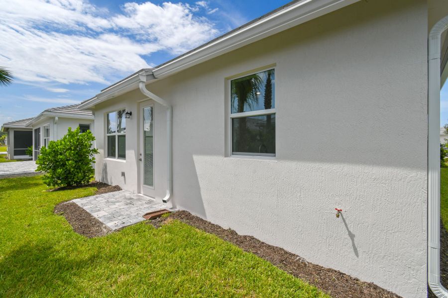 Exterior details and patio area of a home in Harbor Isle, Vero Beach (Image 3).