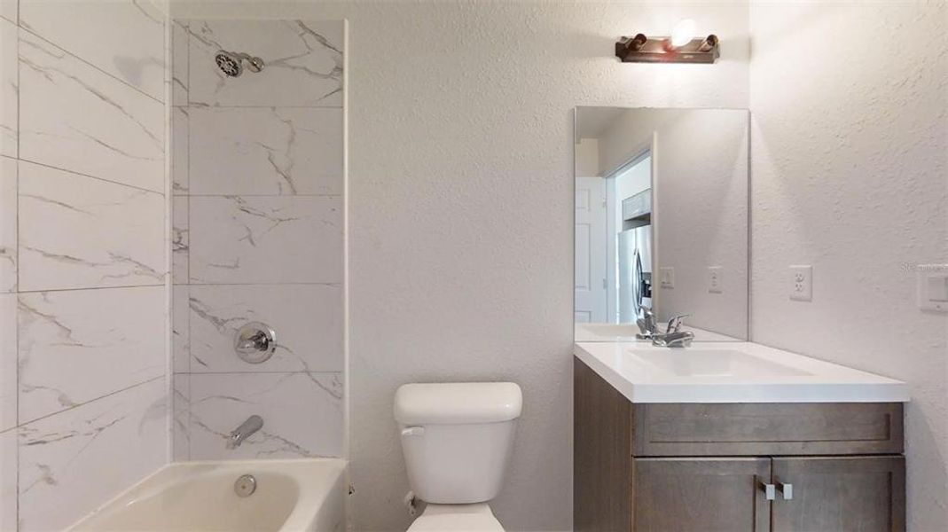 Furnished interior view inside a new home in , Dunnellon (Image 7).