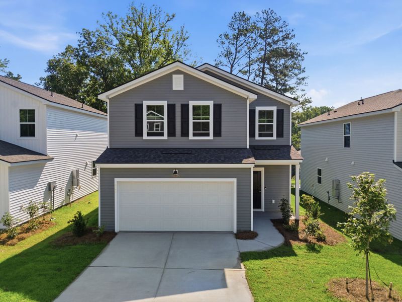 Front exterior of a new home in Grand Arbor, Blythewood, SC, highlighting curb appeal (Image 19). Front exterior of a new home in Grand Arbor, Blythewood, SC, highlighting curb appeal (Image 19).