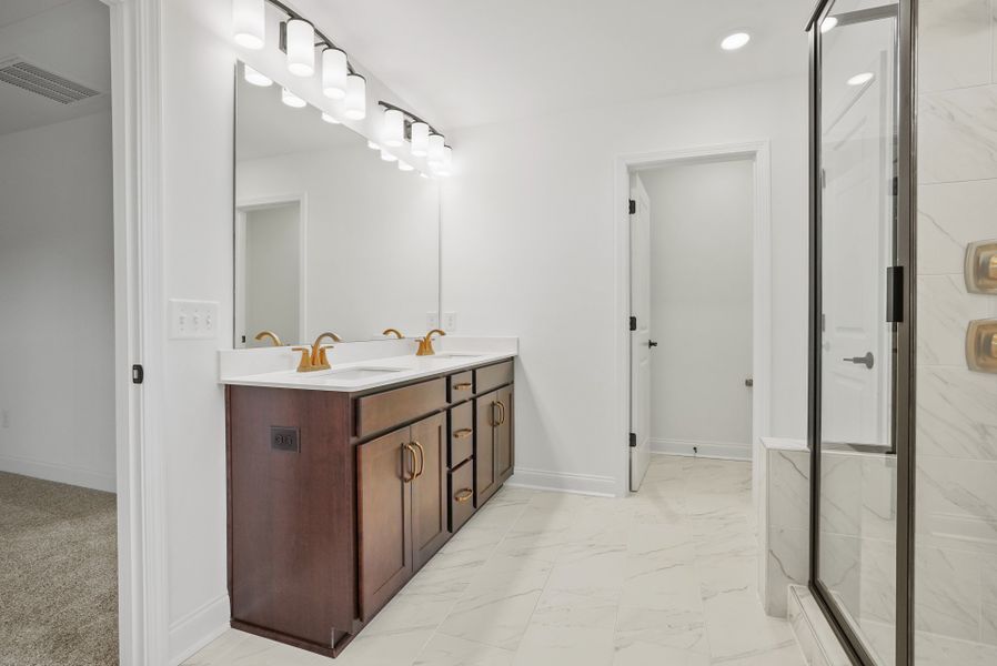 Owner's Bath with Dual Bowl Vanity and Walk-In Shower