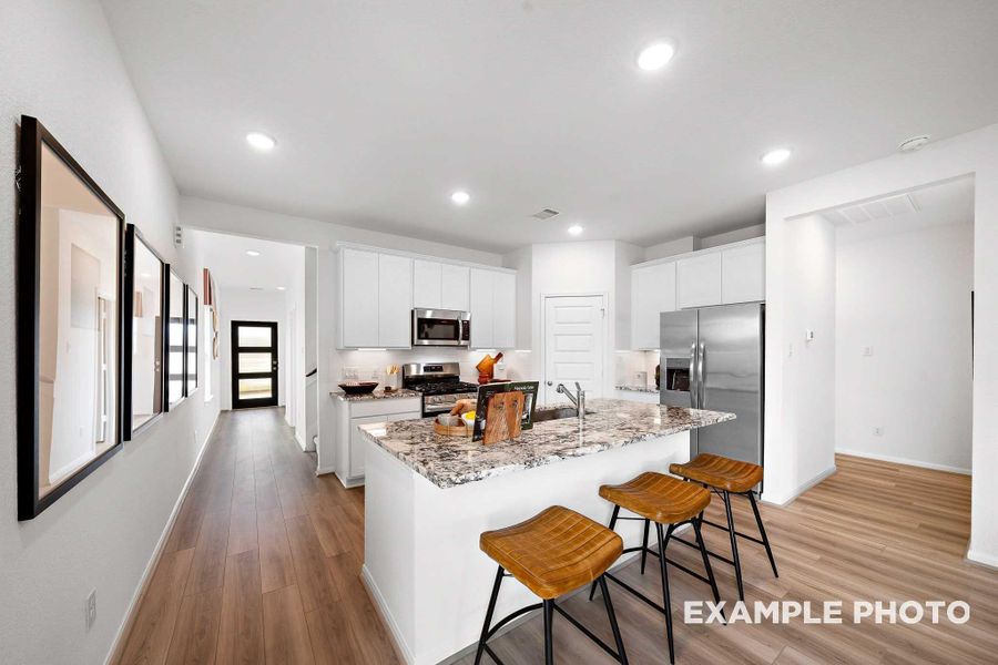 Furnished interior view inside a new home in Caney Creek Place, Conroe (Image 14).