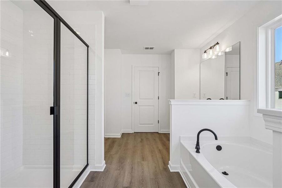 Furnished interior view inside a new home in Eastlyn Crossing - Single Family, Flowery Branch (Image 11). Furnished interior view inside a new home in Eastlyn Crossing - Single Family, Flowery Branch (Image 11).