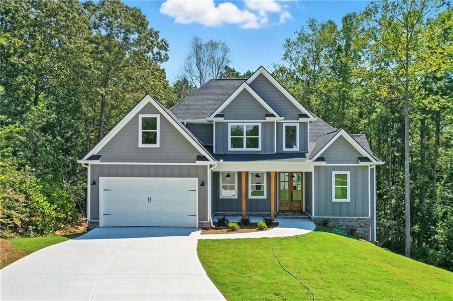 Front exterior of a new home in , Canton, GA, highlighting curb appeal (Image 2). Front exterior of a new home in , Canton, GA, highlighting curb appeal (Image 2).