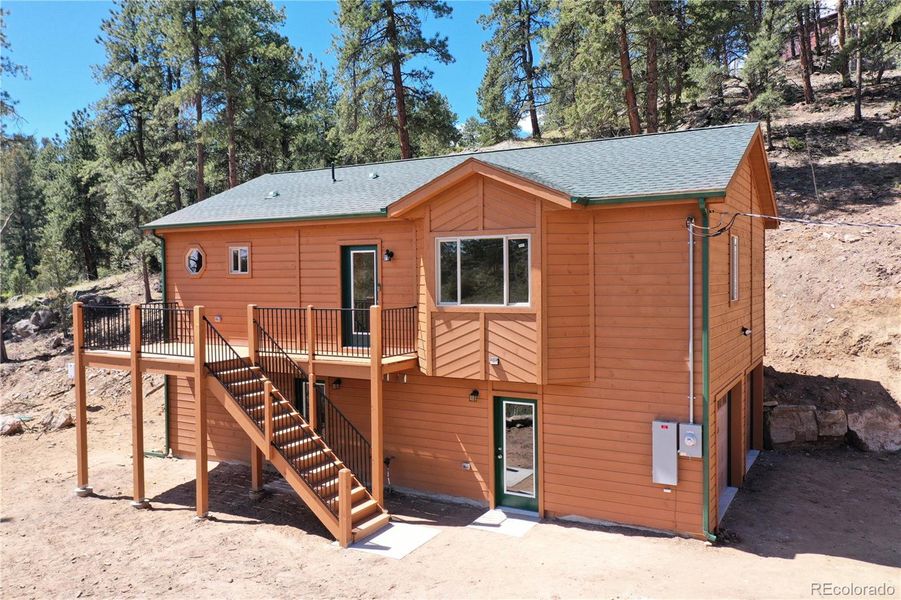 Front exterior of a new home in , Bailey, CO, highlighting curb appeal (Image 17). Front exterior of a new home in , Bailey, CO, highlighting curb appeal (Image 17).