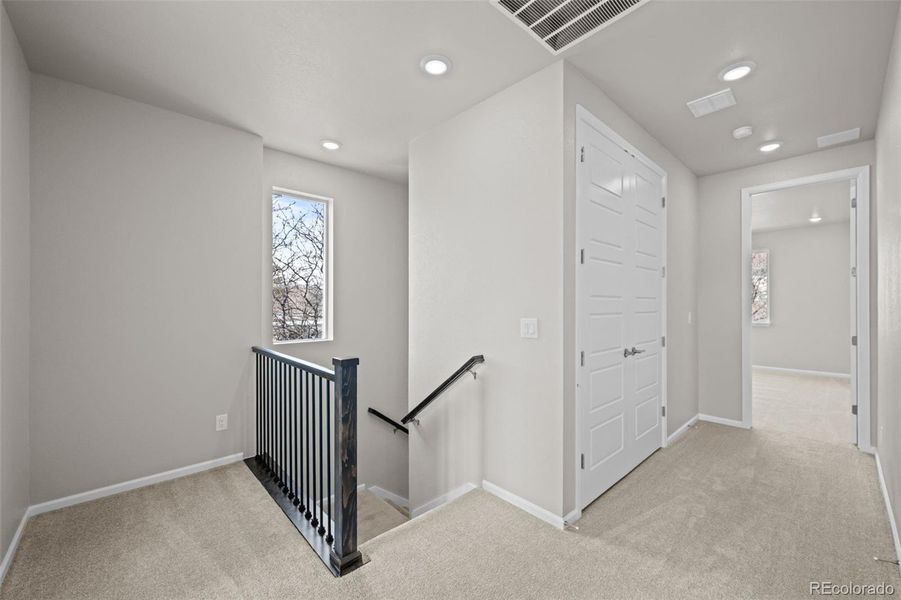 Spacious, unfurnished interior of a new home in Ralston Creek, Arvada (Image 22).