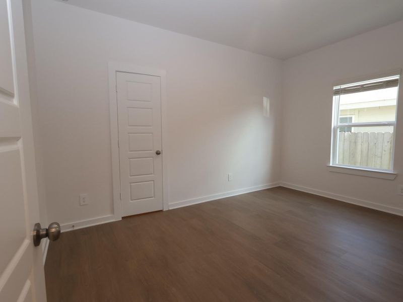 Spacious, unfurnished interior of a new home in Pinewood at Grand Texas, New Caney (Image 17).