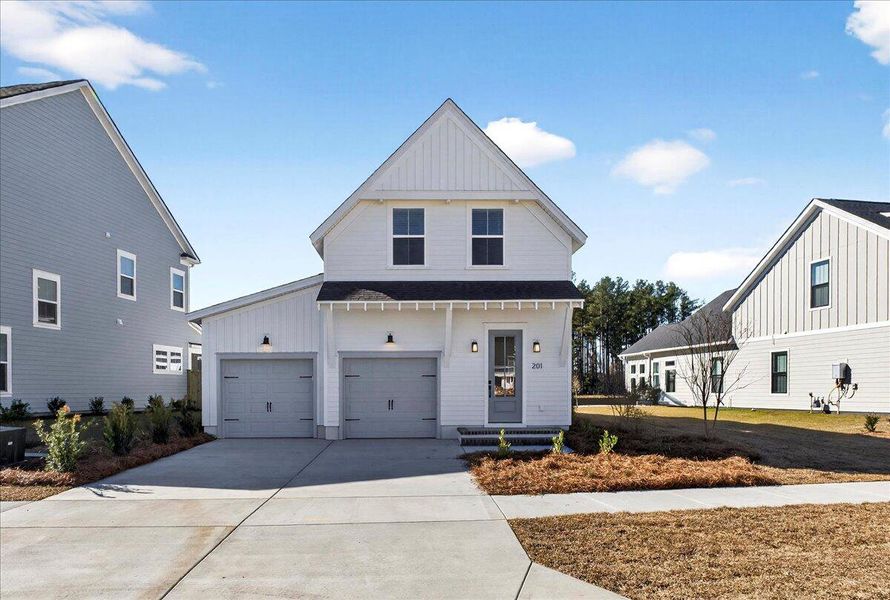 Front exterior of a new home in , Summerville, SC, highlighting curb appeal (Image 21).