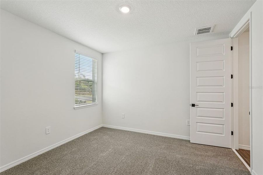 Spacious, unfurnished interior of a new home in Oakfield Trails - Signature Series, Parrish (Image 30).