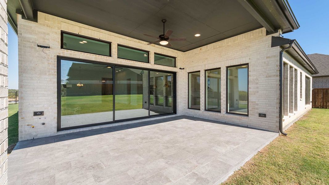 Exterior details and patio area of a home in Talon Hills 60'/70', Fort Worth (Image 2).