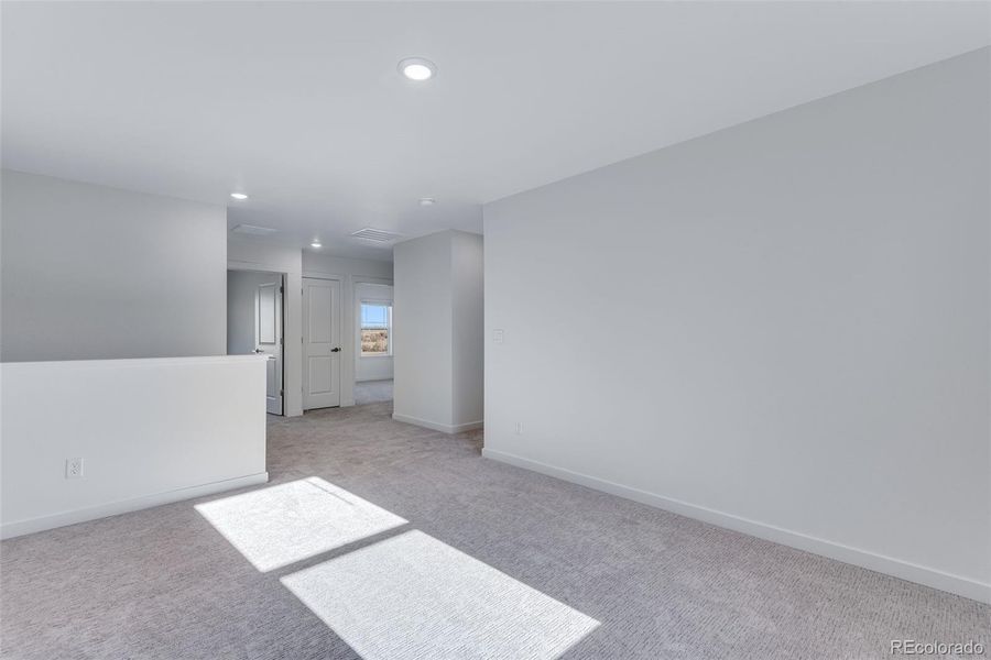 Spacious, unfurnished interior of a new home in Trails at Crowfoot, Parker (Image 33).