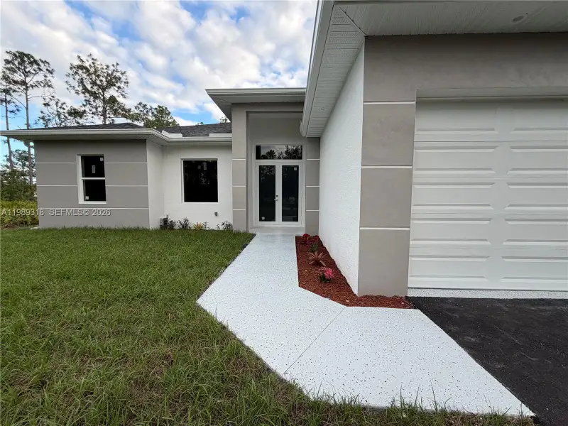 Exterior details and patio area of a home in , Naples (Image 2). Exterior details and patio area of a home in , Naples (Image 2).