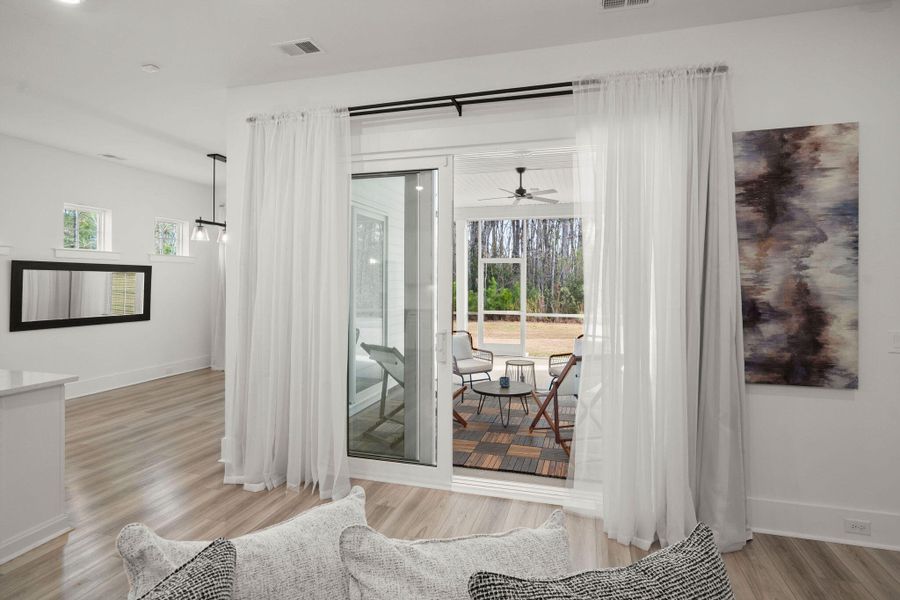 Furnished interior view inside a new home in Summerwind Crossing at Lakes of Cane Bay, Summerville (Image 34).