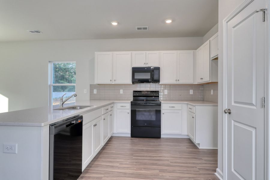 Furnished interior view inside a new home in Hainer Place, Conway (Image 7).
