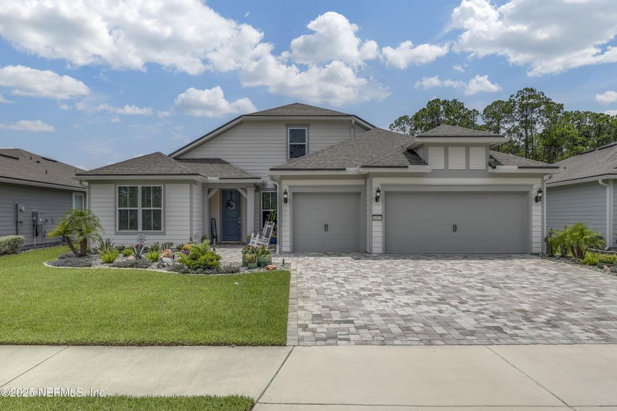Front exterior of a new home in , Jacksonville, FL, highlighting curb appeal (Image 25).