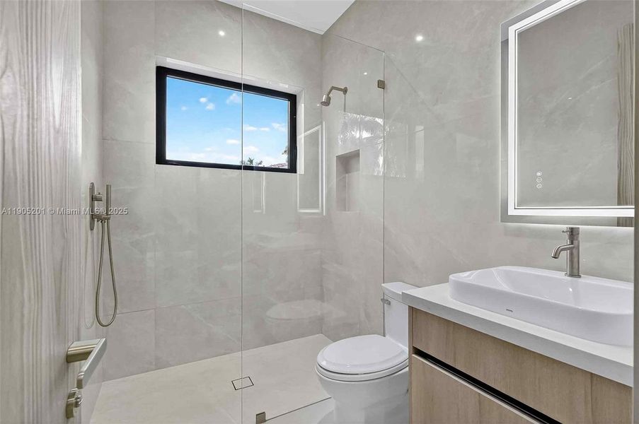 Furnished interior view inside a new home in , Miami Beach (Image 15). Furnished interior view inside a new home in , Miami Beach (Image 15).