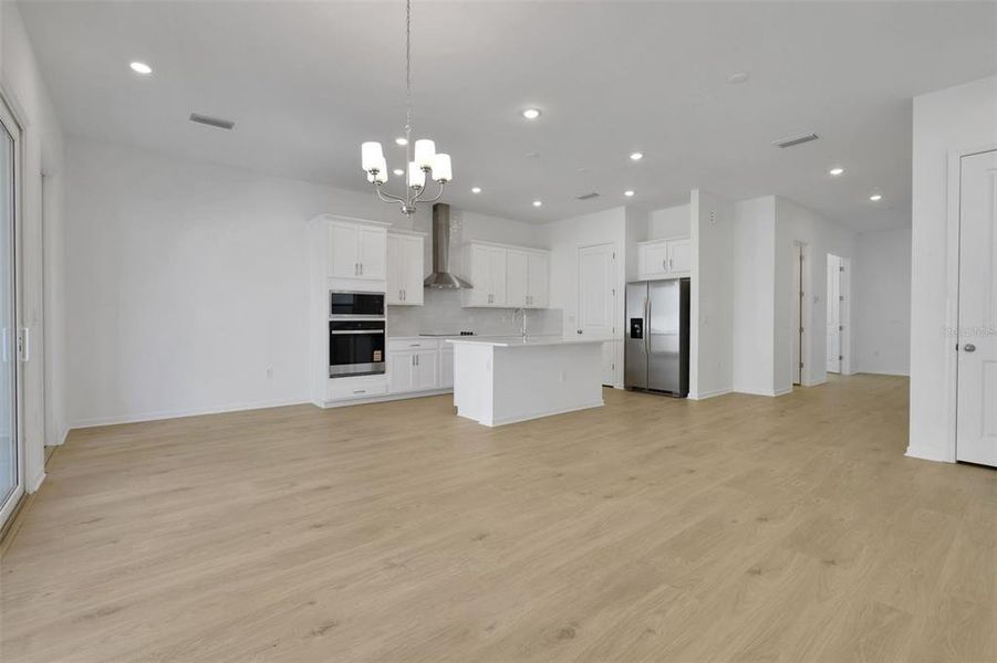 Spacious, unfurnished interior of a new home in Serenade at Ovation, Winter Garden (Image 33).