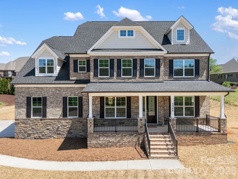 Front exterior of a new home in , Hickory, NC, highlighting curb appeal (Image 24).