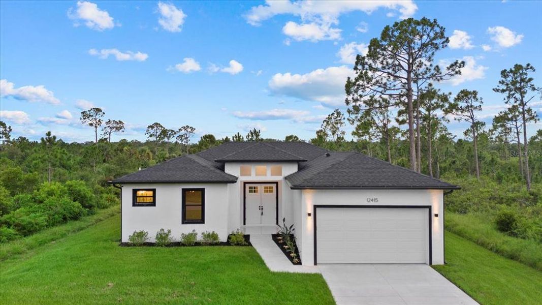 Front exterior of a new home in , Port Charlotte, FL, highlighting curb appeal (Image 24). Front exterior of a new home in , Port Charlotte, FL, highlighting curb appeal (Image 24).