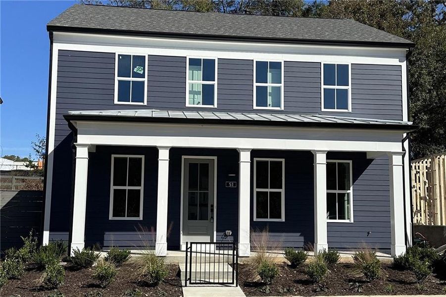 Front exterior of a new home in Harmony, Auburn, GA, highlighting curb appeal (Image 21).