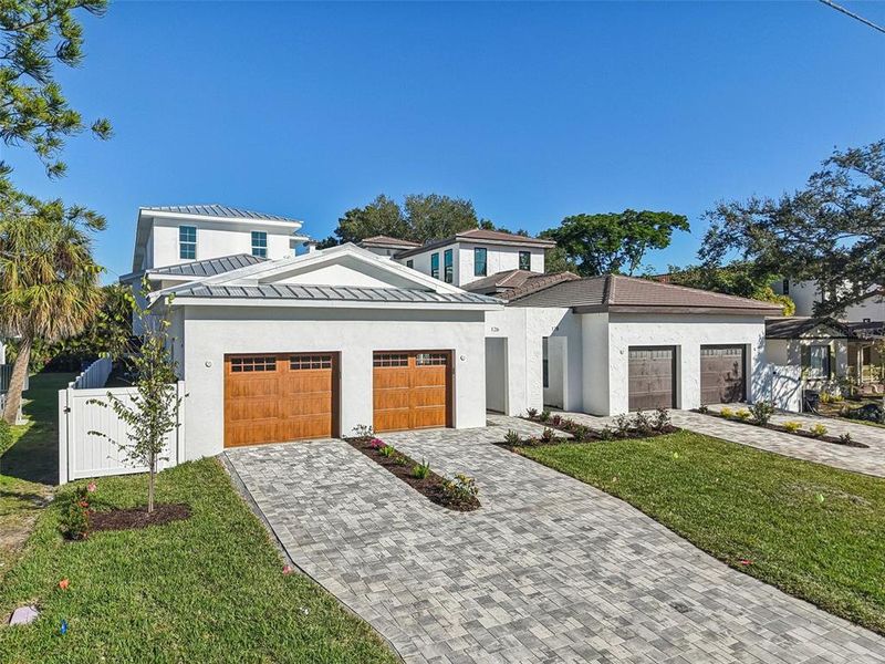 Front exterior of a new home in , St. Petersburg, FL, highlighting curb appeal (Image 29). Front exterior of a new home in , St. Petersburg, FL, highlighting curb appeal (Image 29).
