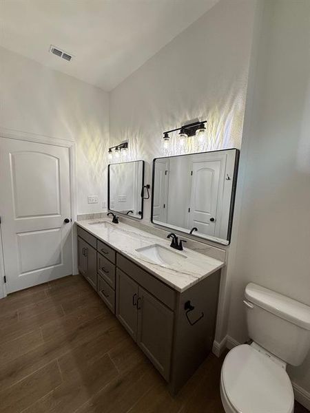 Bathroom featuring double vanity