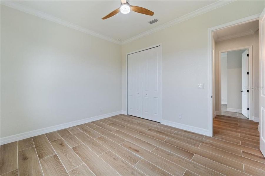 Spacious, unfurnished interior of a new home in , Port Charlotte (Image 32).