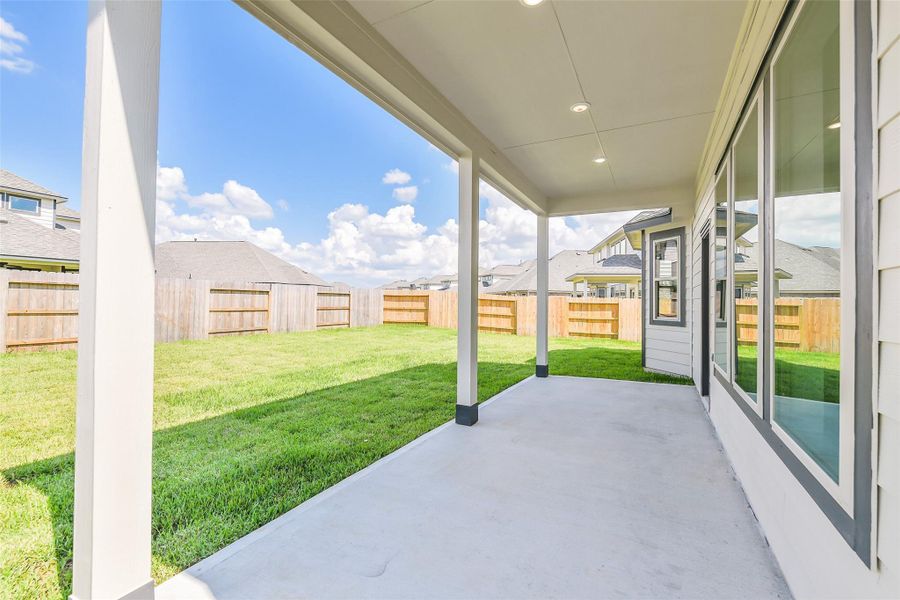 Exterior details and patio area of a home in Stone Creek Ranch, Hockley (Image 26).