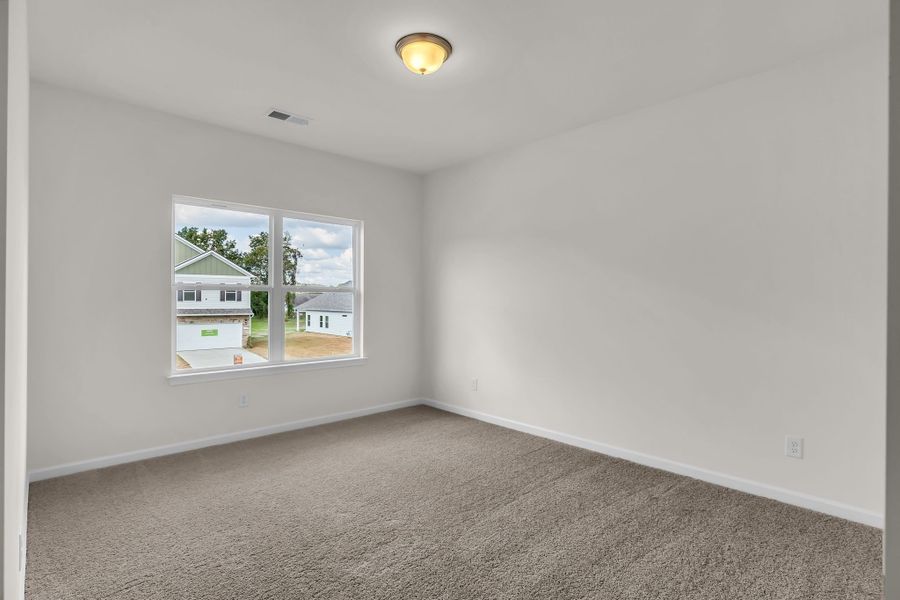 Large bedroom for the upstairs junior en suite. Large bedroom for the upstairs junior en suite.