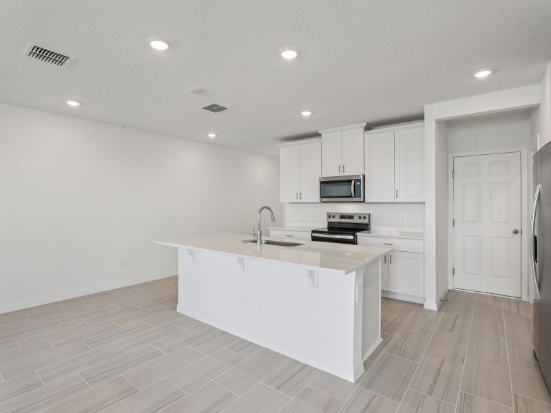 Furnished interior view inside a new home in The Meadow at Crossprairie Townes, St. Cloud (Image 4). Furnished interior view inside a new home in The Meadow at Crossprairie Townes, St. Cloud (Image 4).