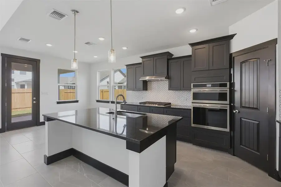 Representative furnished interior of a home built from the Bennington 2434 S 3CG by Saratoga Homes in Turnbo Ranch, Killeen (Image 6).
