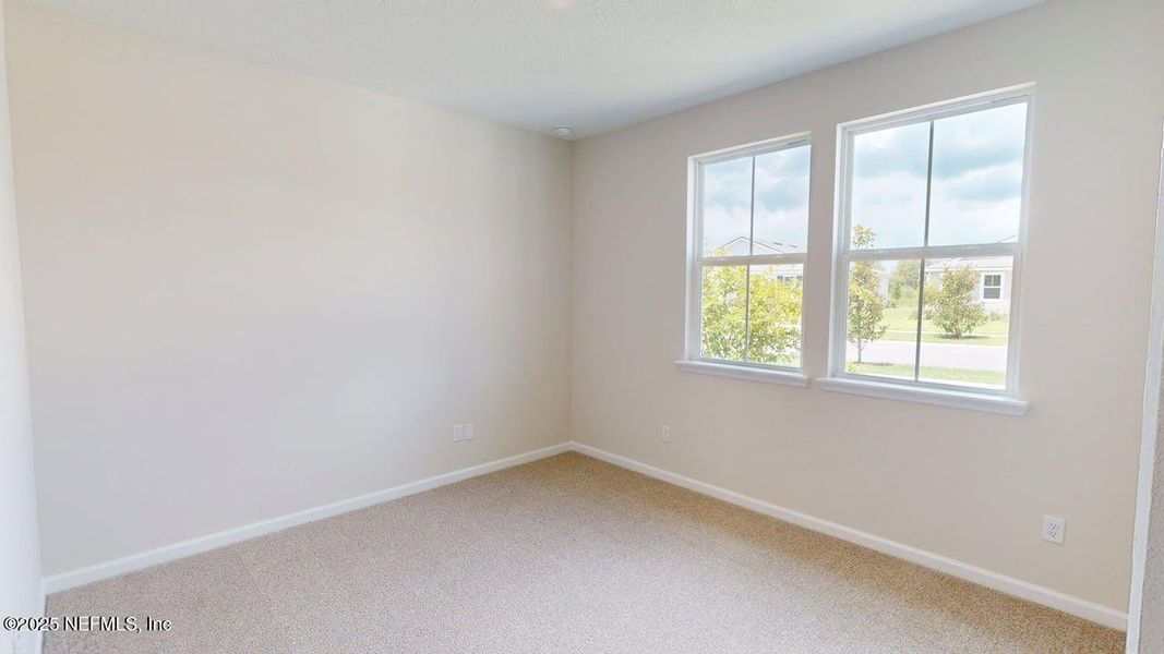 Spacious, unfurnished interior of a new home in Lakes at Bella Lago, Green Cove Springs (Image 11).