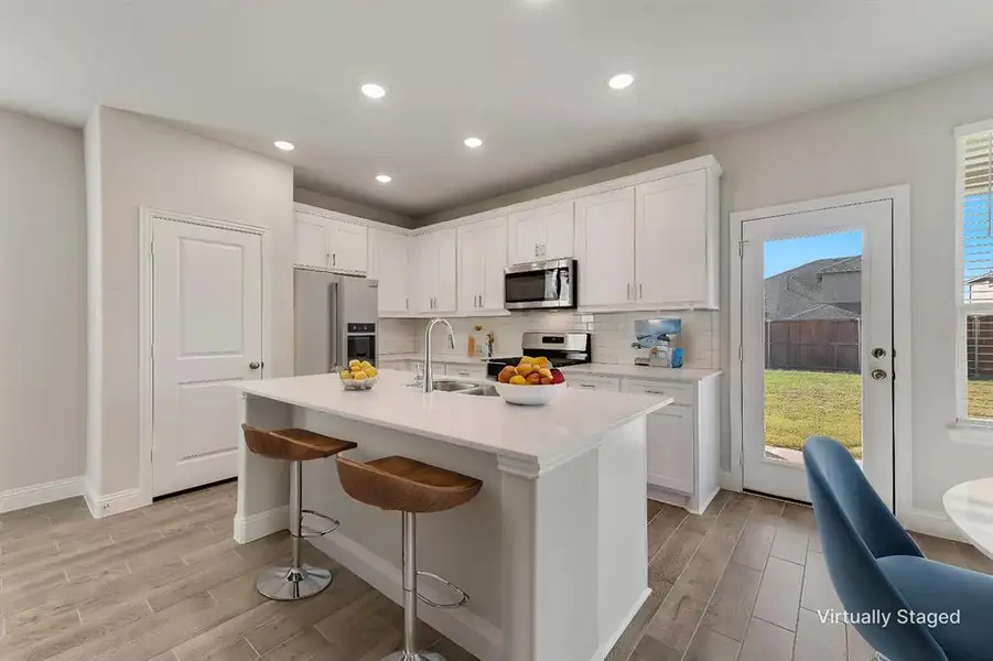 Furnished interior view inside a new home in AnaCapri, Anna (Image 7). Furnished interior view inside a new home in AnaCapri, Anna (Image 7).