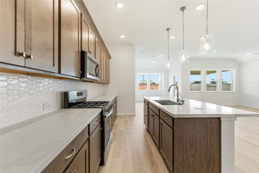 Furnished interior view inside a new home in Sunterra, Katy (Image 5).