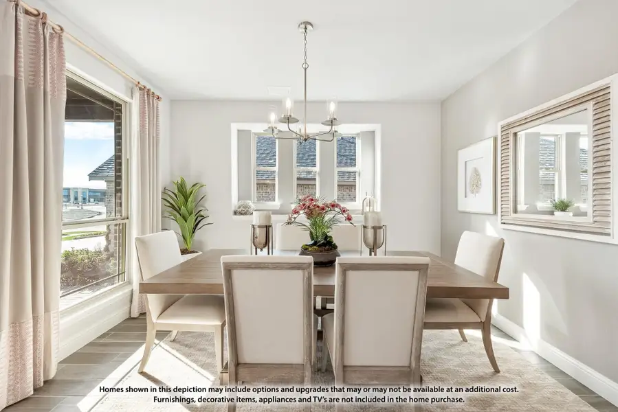 Dining room with wood table, upholstered chairs, chandelier, and large windows with natural light Dining room with wood table, upholstered chairs, chandelier, and large windows with natural light