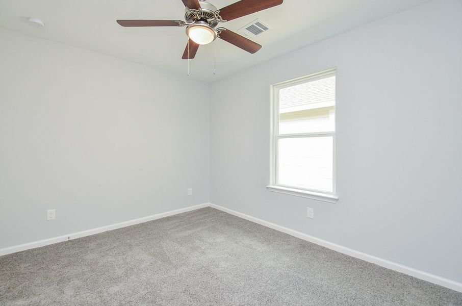 Flexible bedroom perfect for kids, guests, or a second office.