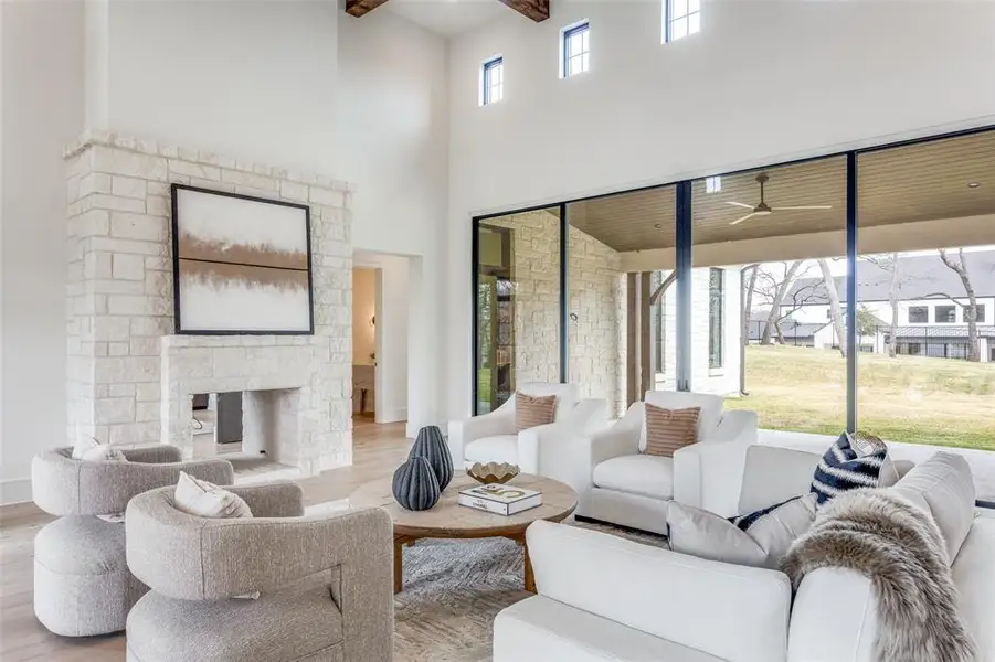 Fabulous open floor plan with natural light coming through and access to spacious patio.