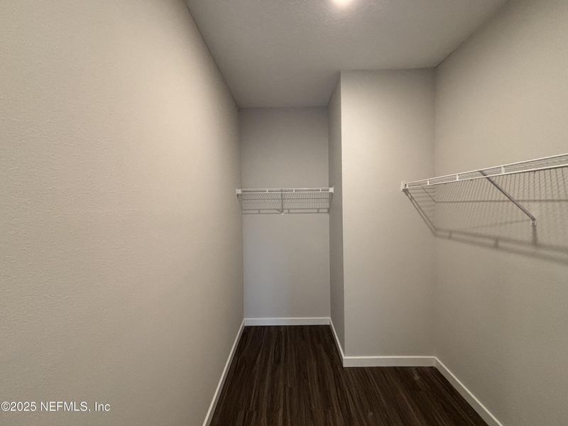 Spacious, unfurnished interior of a new home in The Cypress Series at Reserve East, Flagler Beach (Image 22).